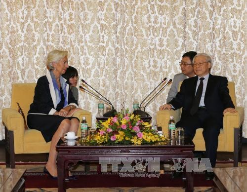 Party General Secretary Nguyen Phu Trong receives IMF Managing Director - ảnh 1